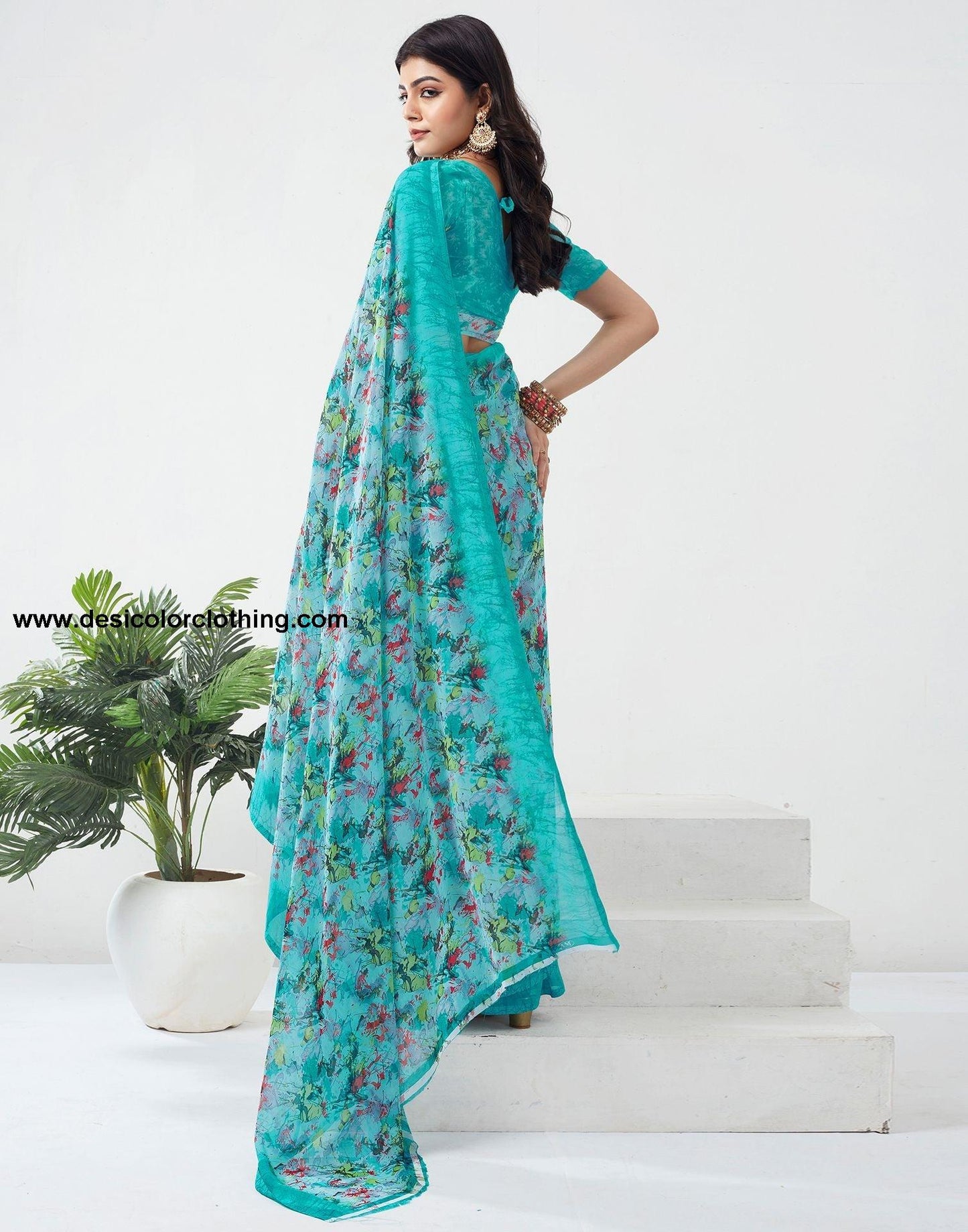 Turquoise Printed Georgette Saree