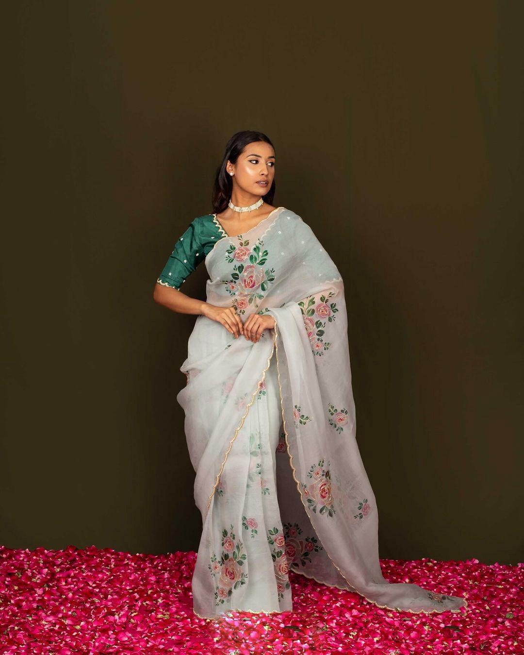 Product Image - Designer Satin Organza Saree with Handcrafted Floral Prints and Pearl Cutwork Border