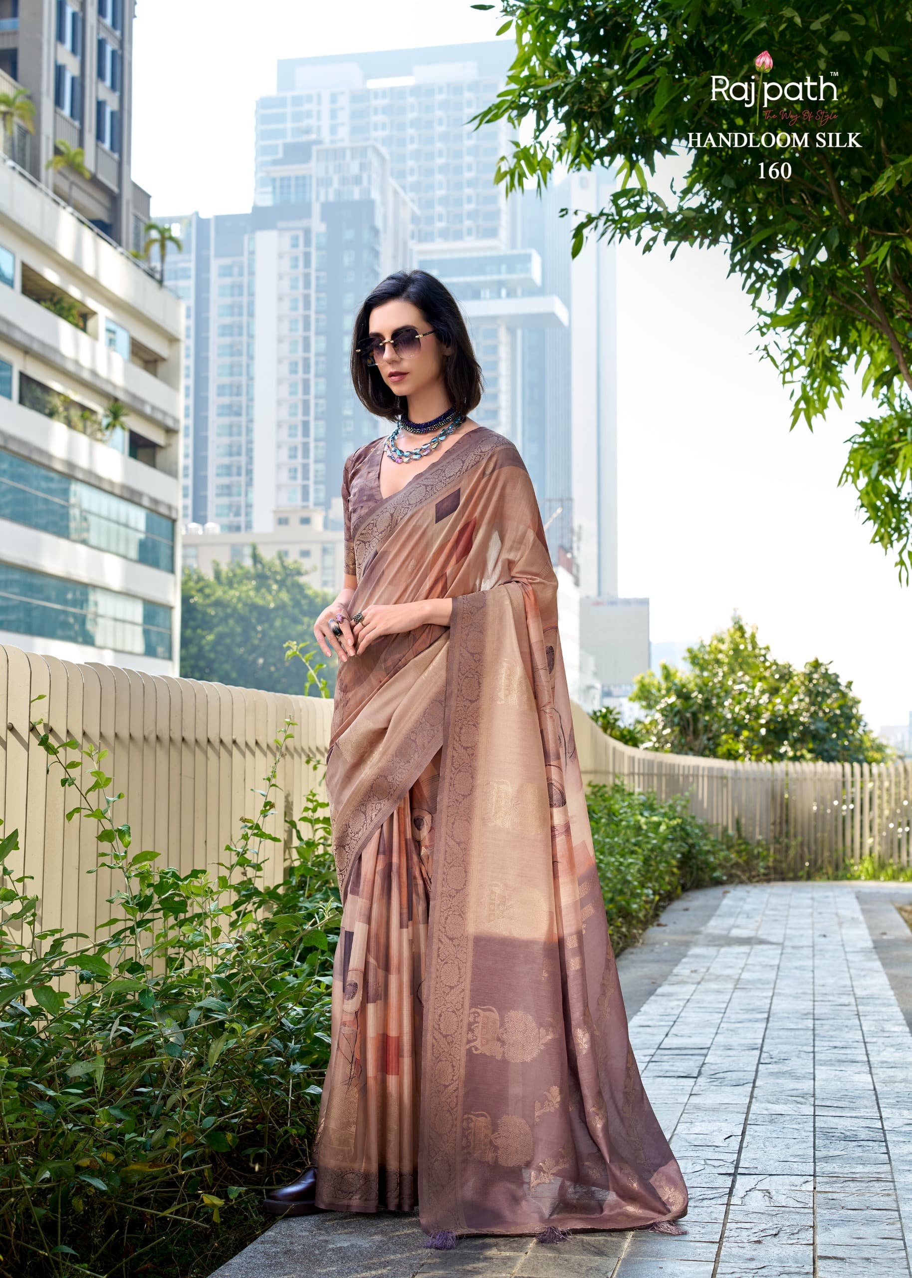 Product Image - Designer Zimmy Choo Silk Saree with Embroidered Border & Lehiriya Design