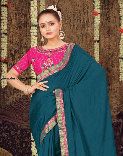 Rani Pink Art Silk Blouse with Dark Teal Blue Poly Silk Saree
