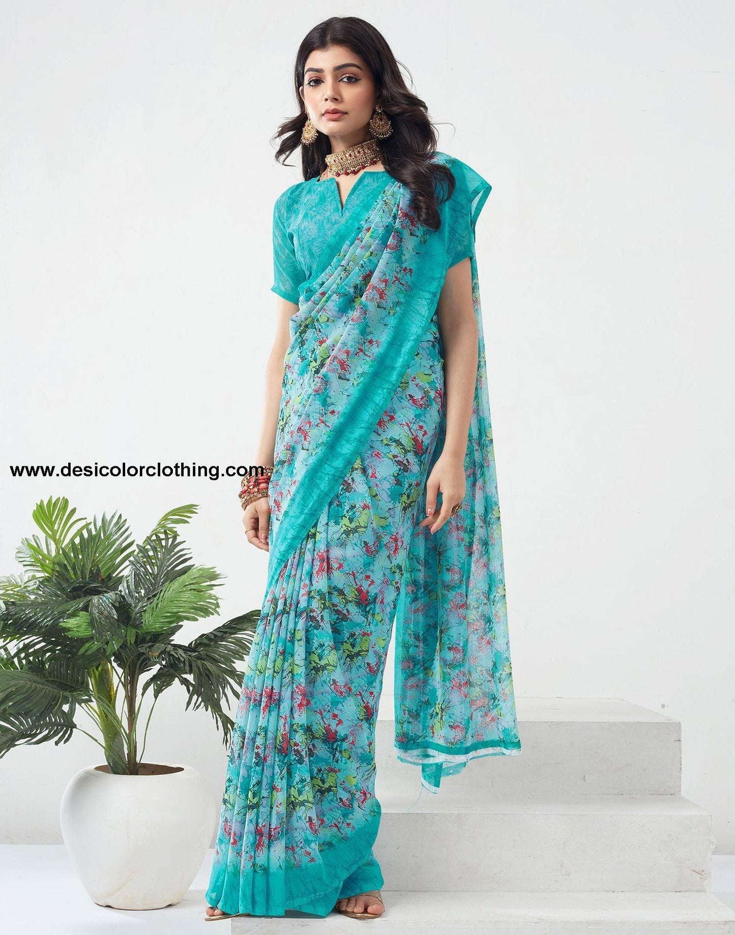 Turquoise Printed Georgette Saree