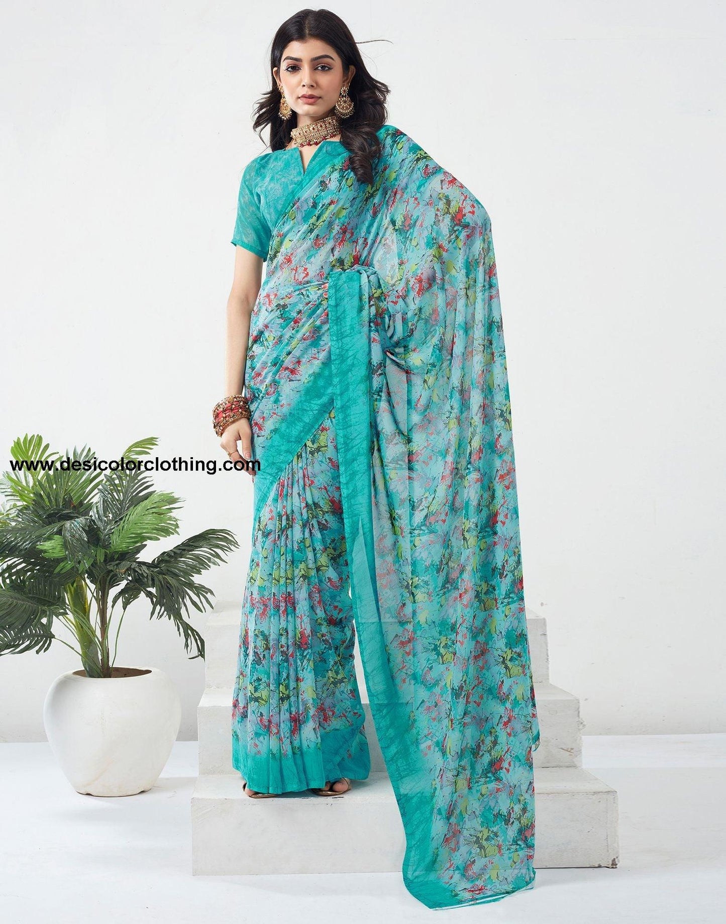 Turquoise Printed Georgette Saree