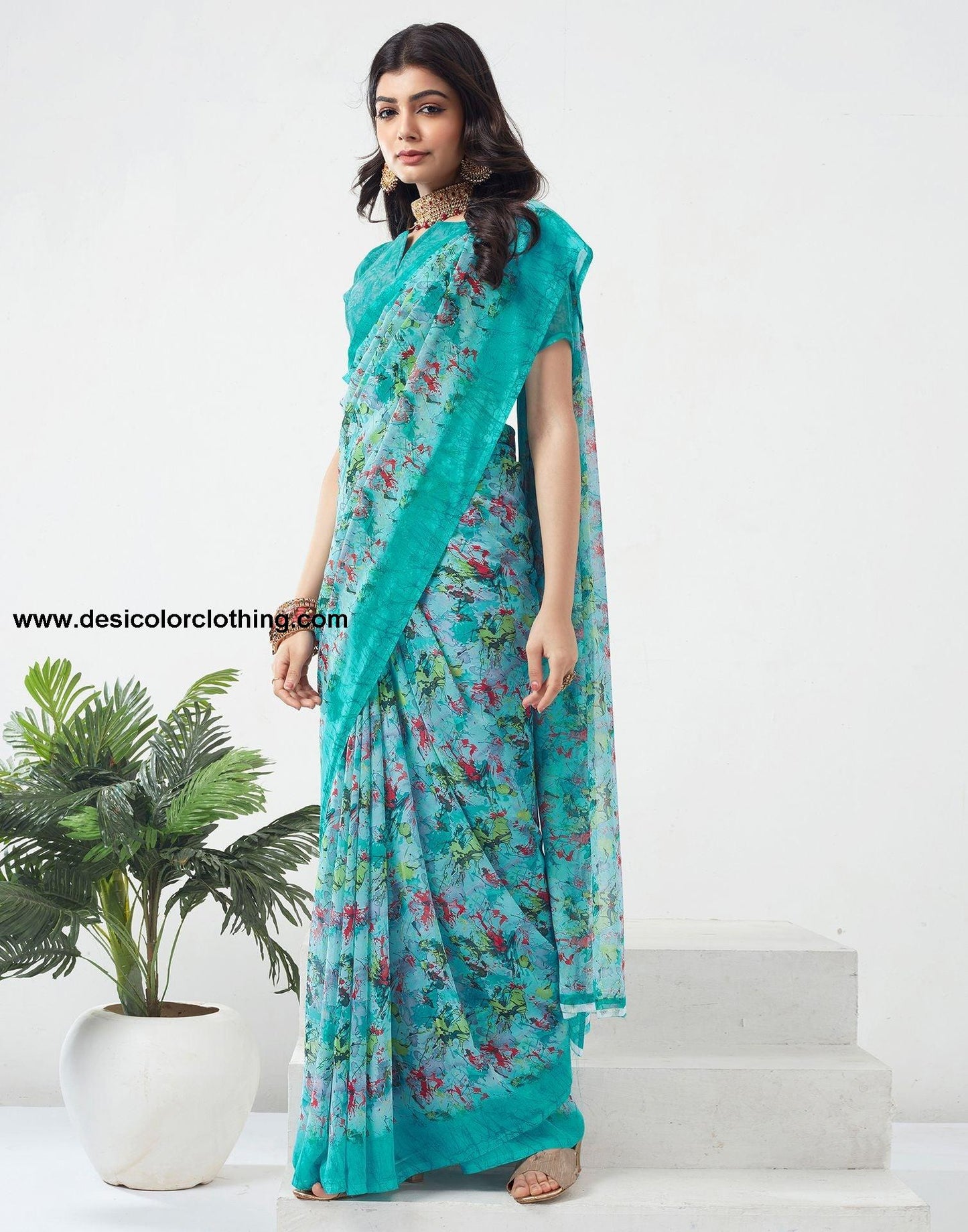 Turquoise Printed Georgette Saree