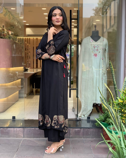 Product Image - X-Lady Festive 2025 Collection: Black Elephant Heavy Suit Set