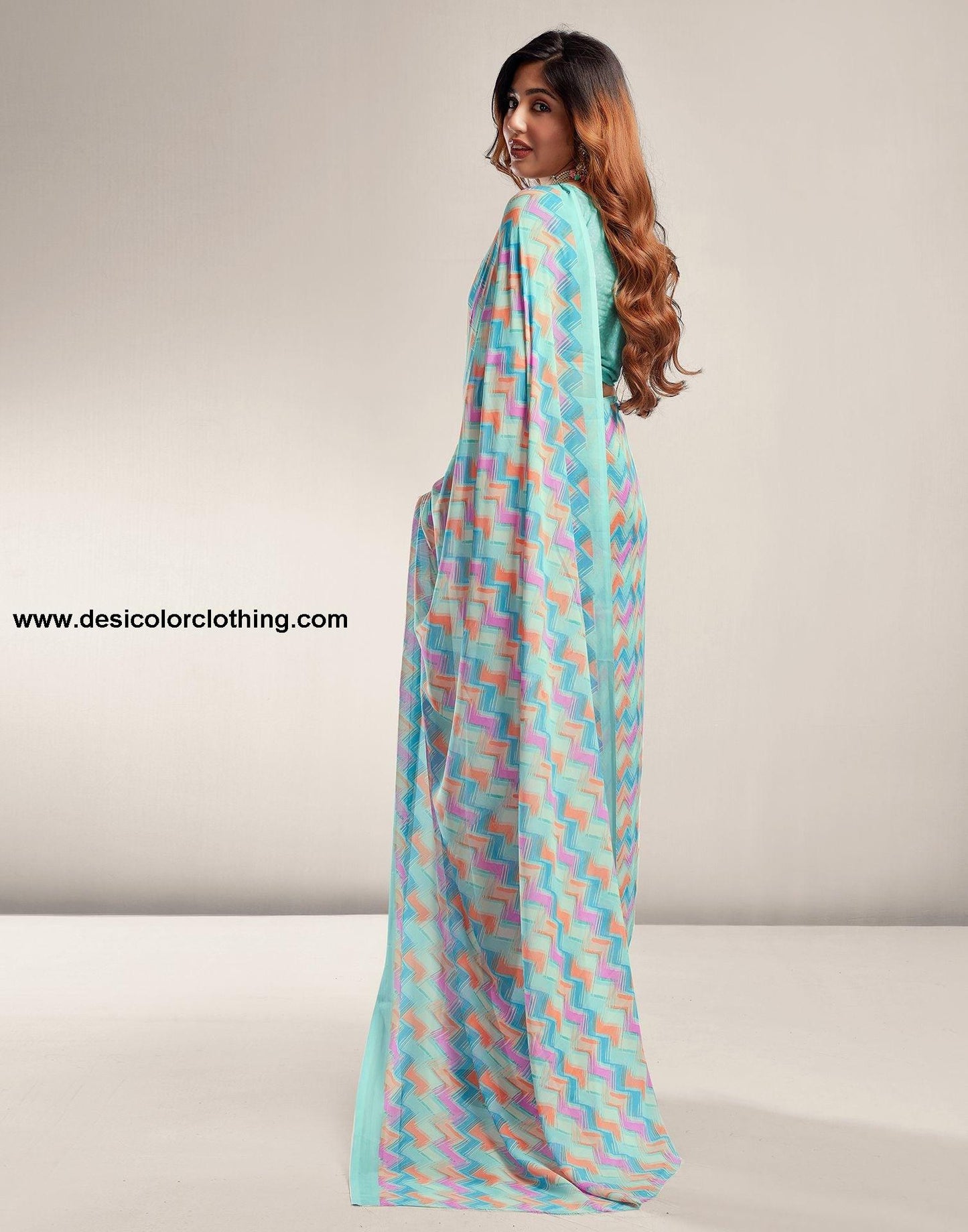 Turquoise Printed Georgette Saree