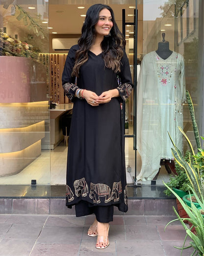 Product Image - X-Lady Festive 2025 Collection: Black Elephant Heavy Suit Set