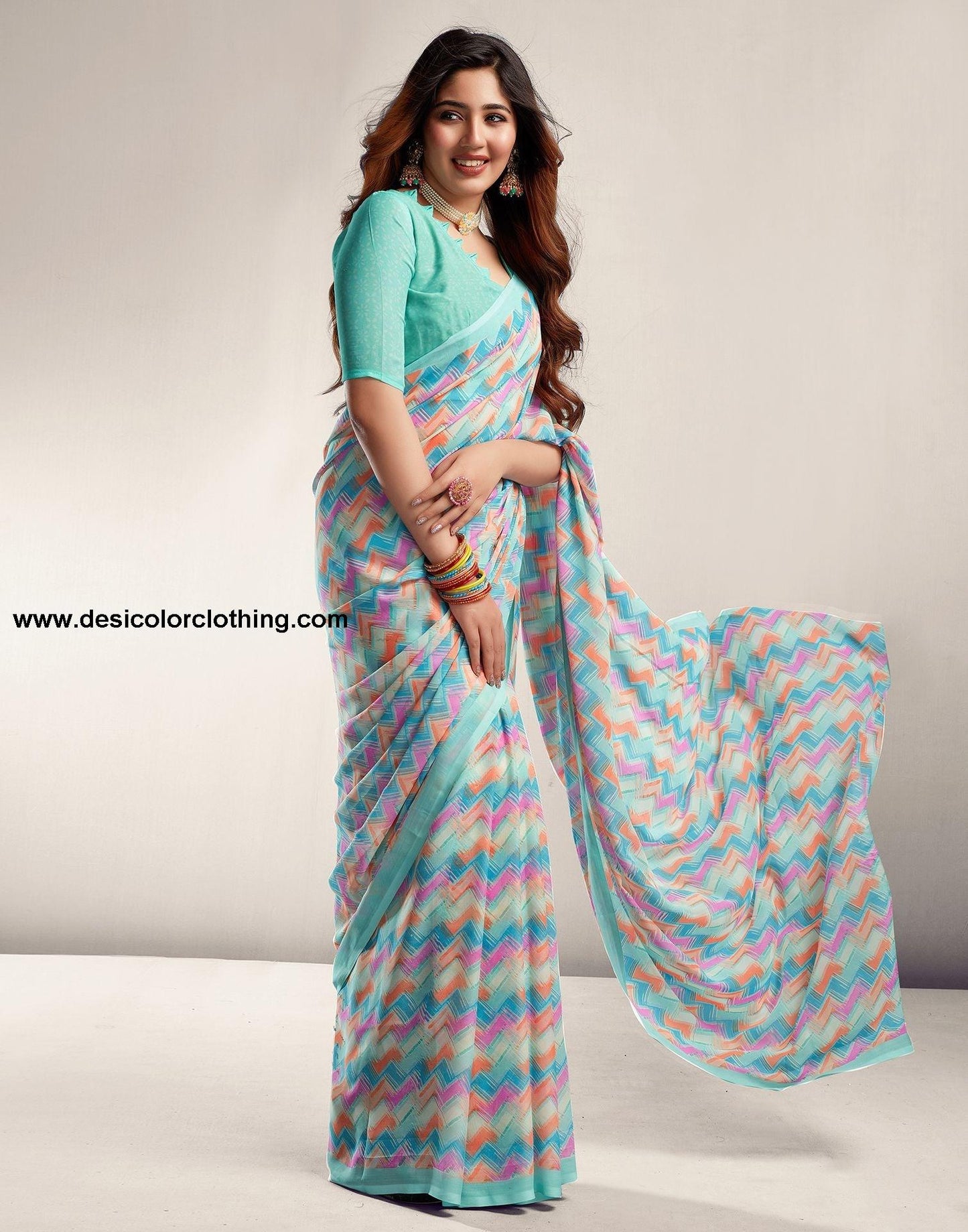 Turquoise Printed Georgette Saree