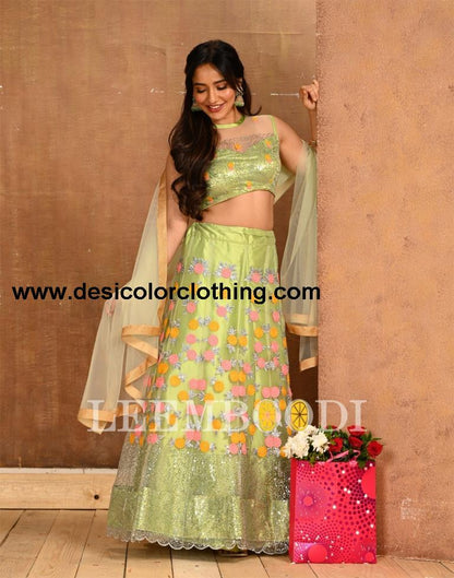 Pista Cream Coloured Net Sequence Embroidered Partywear Lehenga  | SLV125L10496
