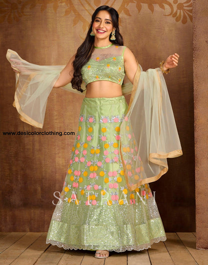 Pista Cream Coloured Net Sequence Embroidered Partywear Lehenga  | SLV125L10496