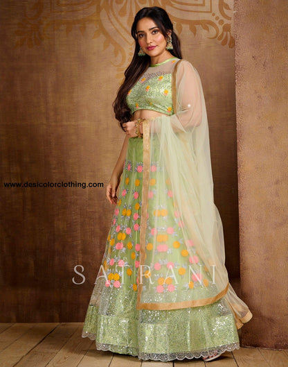 Pista Cream Coloured Net Sequence Embroidered Partywear Lehenga  | SLV125L10496