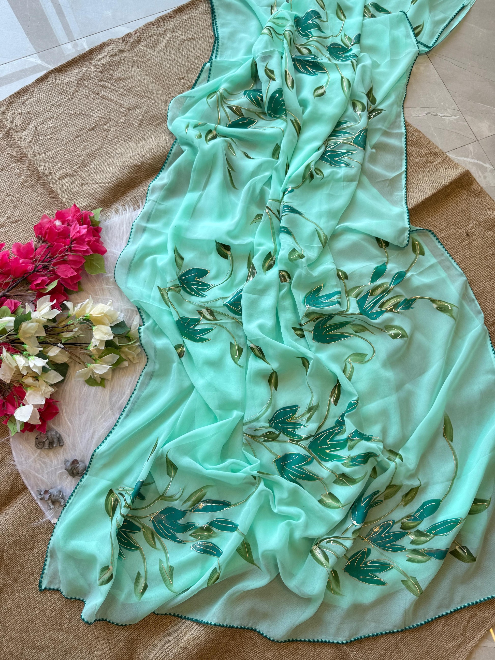 Product Image - Elegant Designer Georgette Saree